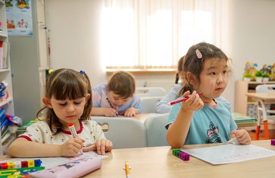 Children studying in classroom